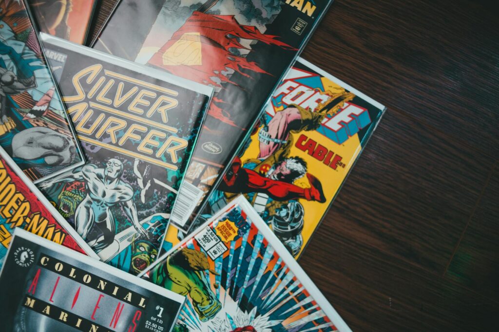 assorted comic books with colorful covers on floor